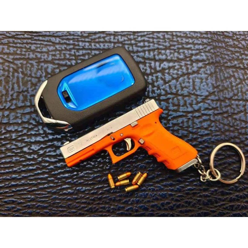 Alloy Empire 1:3G17 Glock Throwing Shell Alloy Keychain Pendant Metal Mini Toy Gun Cannot be Launched