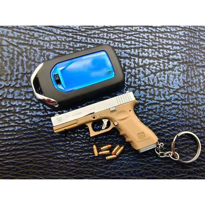 Alloy Empire 1:3G17 Glock Throwing Shell Alloy Keychain Pendant Metal Mini Toy Gun Cannot be Launched