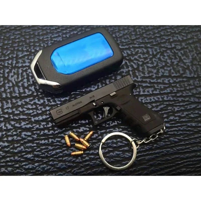 Alloy Empire 1:3G17 Glock Throwing Shell Alloy Keychain Pendant Metal Mini Toy Gun Cannot be Launched