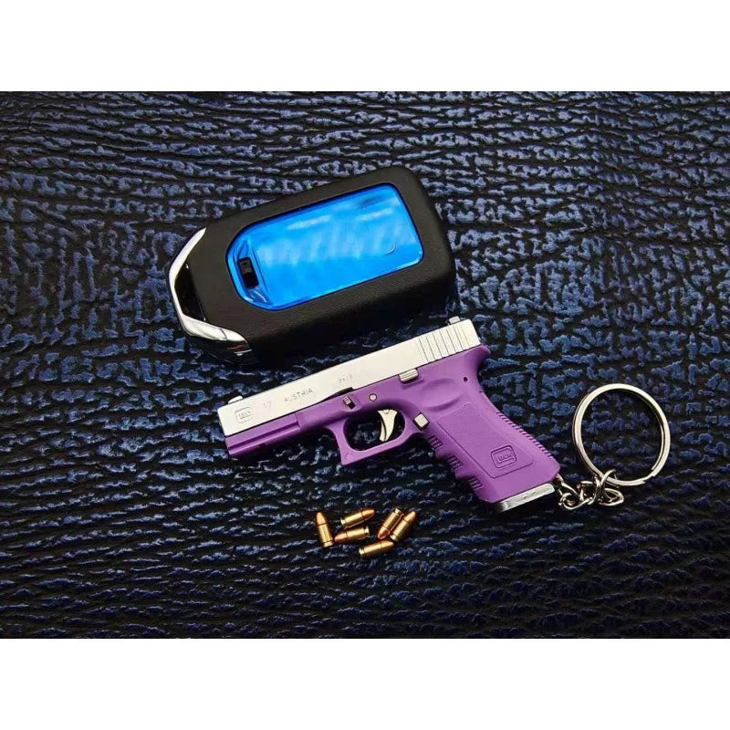 Alloy Empire 1:3G17 Glock Throwing Shell Alloy Keychain Pendant Metal Mini Toy Gun Cannot be Launched