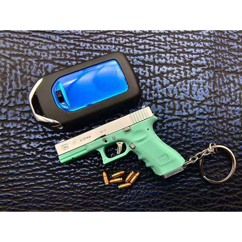 Alloy Empire 1:3G17 Glock Throwing Shell Alloy Keychain Pendant Metal Mini Toy Gun Cannot be Launched