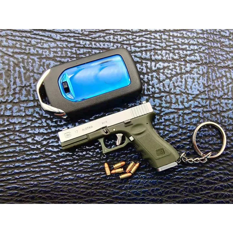 Alloy Empire 1:3G17 Glock Throwing Shell Alloy Keychain Pendant Metal Mini Toy Gun Cannot be Launched