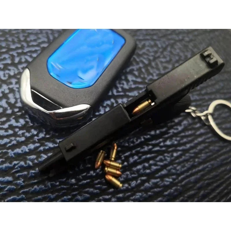 Alloy Empire 1:3G17 Glock Throwing Shell Alloy Keychain Pendant Metal Mini Toy Gun Cannot be Launched