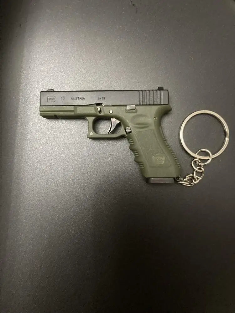 Alloy Empire 1:3G17 Glock Throwing Shell Alloy Keychain Pendant Metal Mini Toy Gun Cannot be Launched