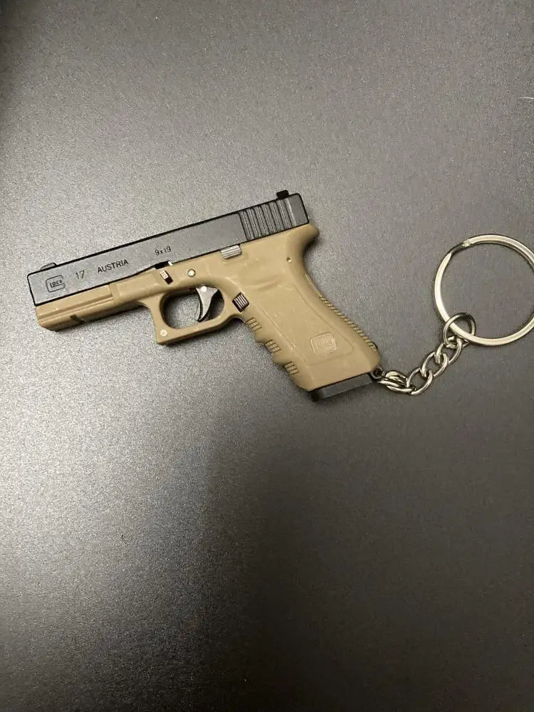 Alloy Empire 1:3G17 Glock Throwing Shell Alloy Keychain Pendant Metal Mini Toy Gun Cannot be Launched