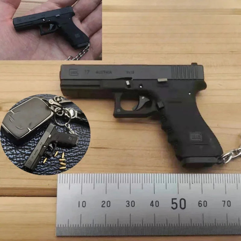 Alloy Empire 1:3G17 Glock Throwing Shell Alloy Keychain Pendant Metal Mini Toy Gun Cannot be Launched